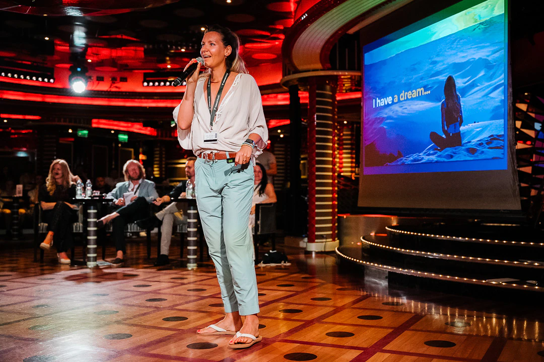 Lera pitching Nomad Magazine idea at Nomad Cruise 11 startup pitch event in 2023
