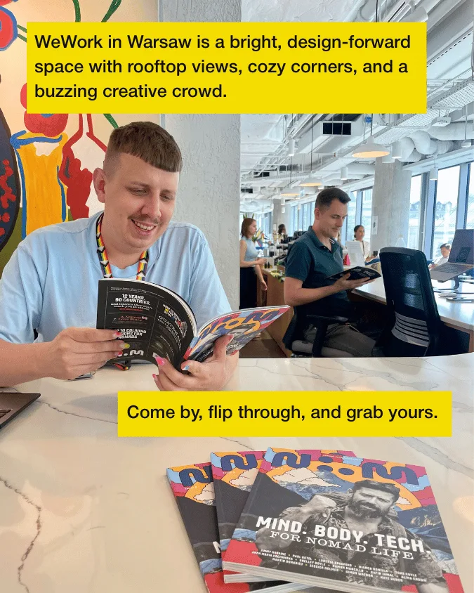 Person reading Nomad Magazine at WeWork Warsaw