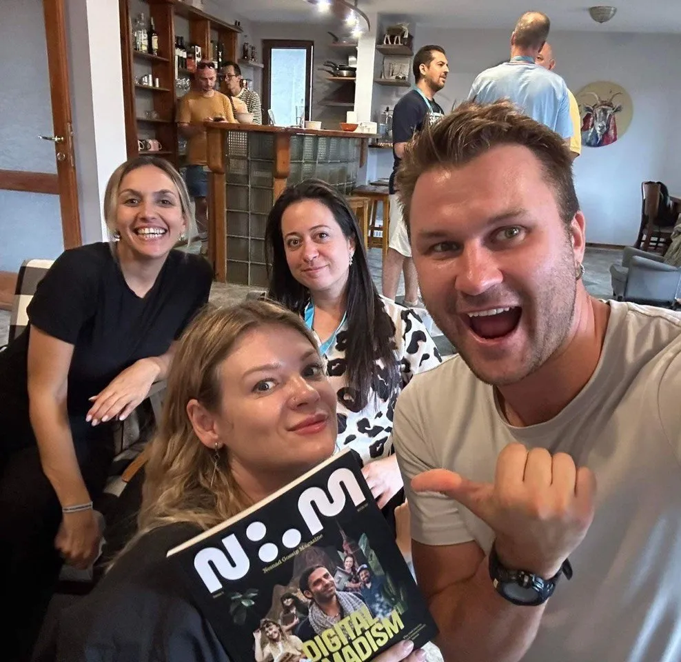 Nomad Magazine copies displayed at Nomad Cruise booth during Bansko Nomad Fest 2024