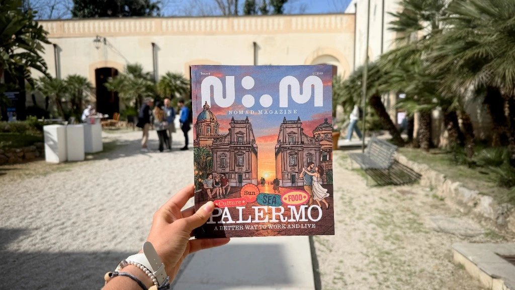 Holding Nomad Magazine Edition Four in Palermo, Italy