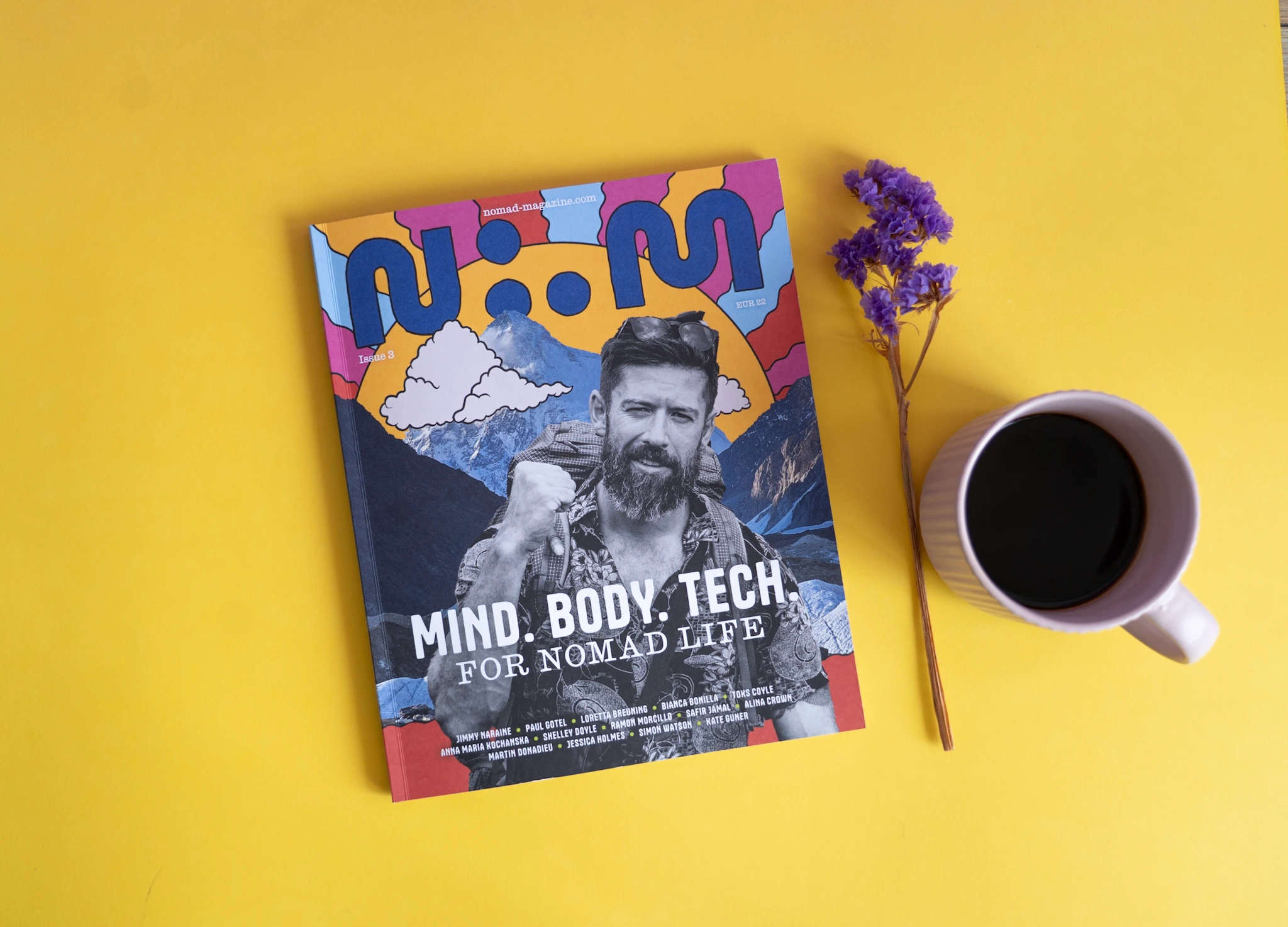 Nomad Magazine on yellow background