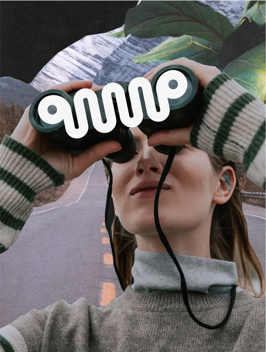 Woman with binoculars looking out over a road, representing the growing digital nomad community